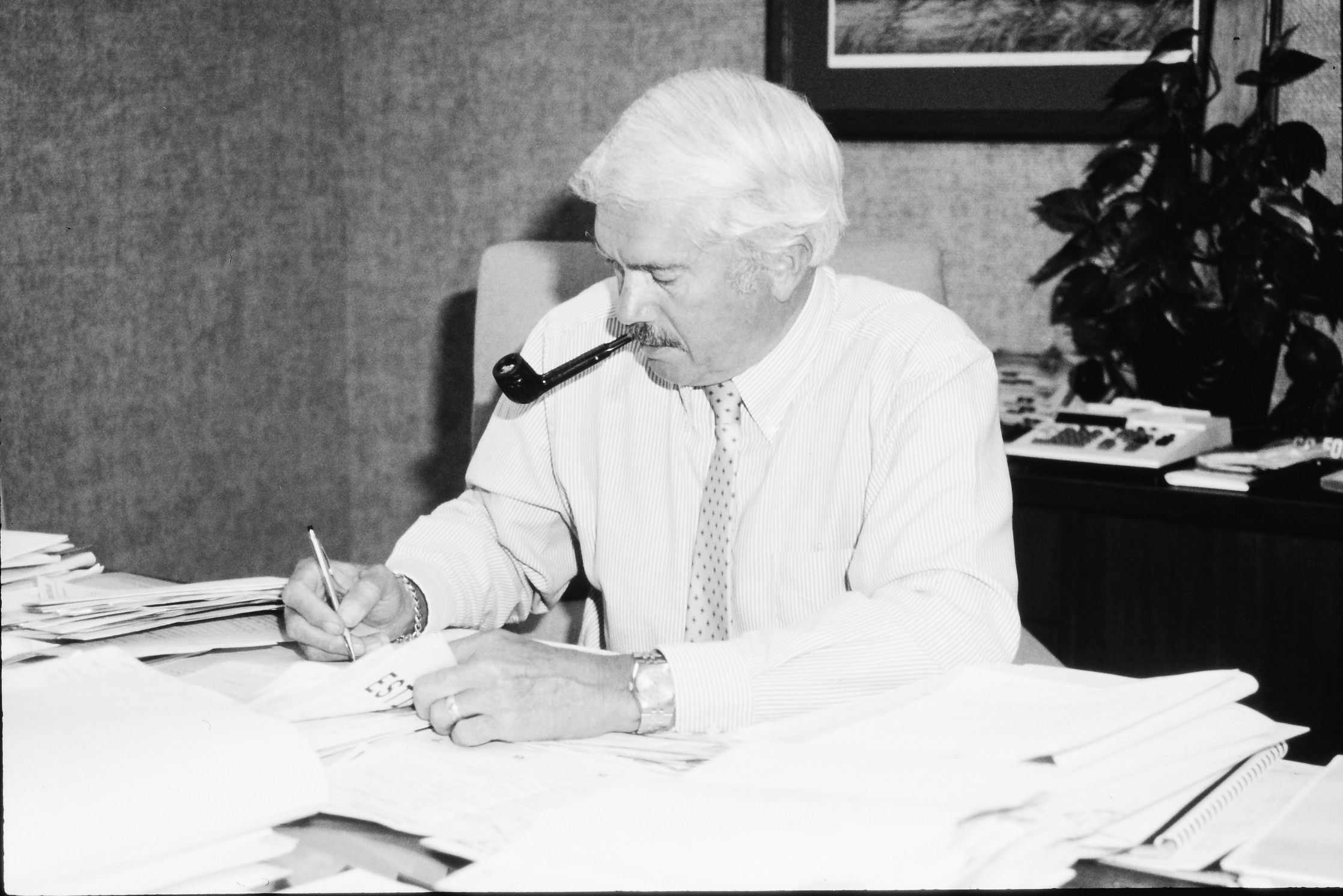 1980s-richard-l-schmidt-working-at-desk 1980s-richard-l-schmidt-working-at-desk