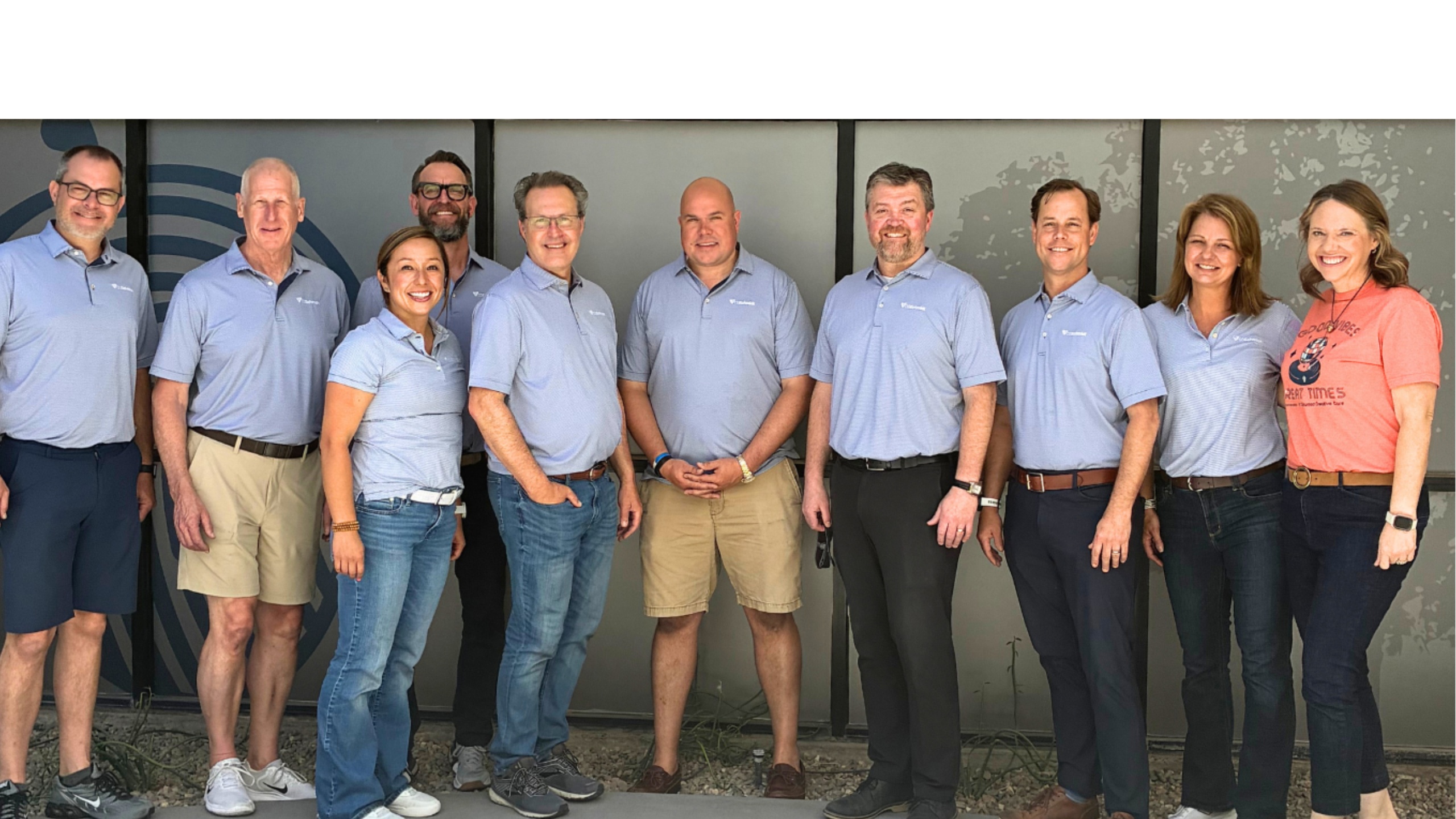 CG Schmidt team gathered together to build new gym equipment for Oakwood Creative Care's new OakFit Gym