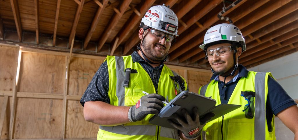 CG Schmidt Project Engineers looking over notes at MKE Rec